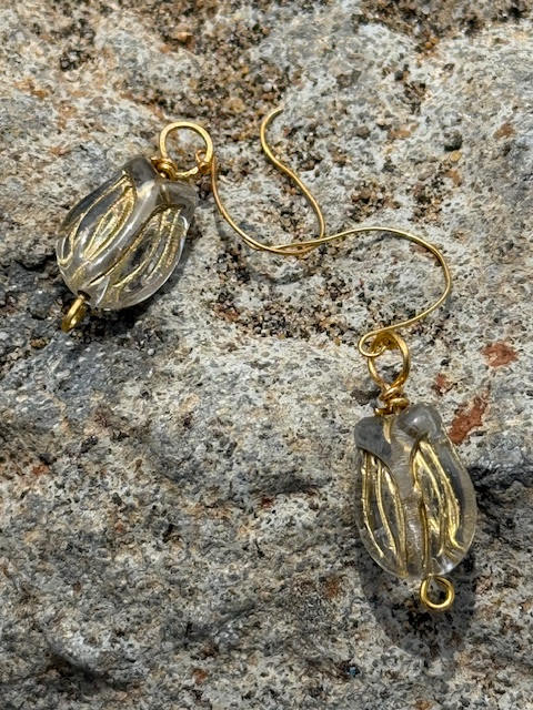 earrings sold separately